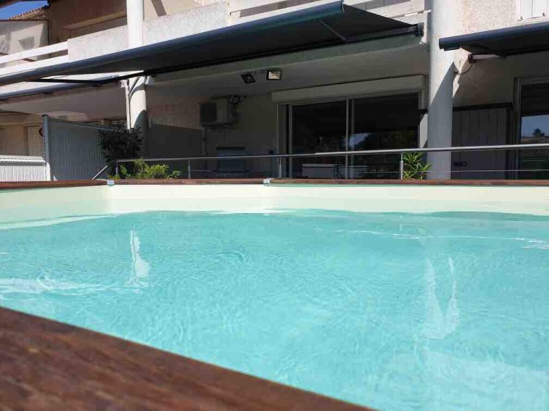 Pose d'un store  banne coffre ambre sur Martigues