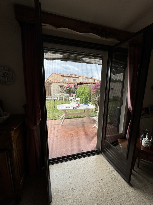 Mise en place d'une moustiquaires pour porte fenêtre sur Château-neuf les Martigues