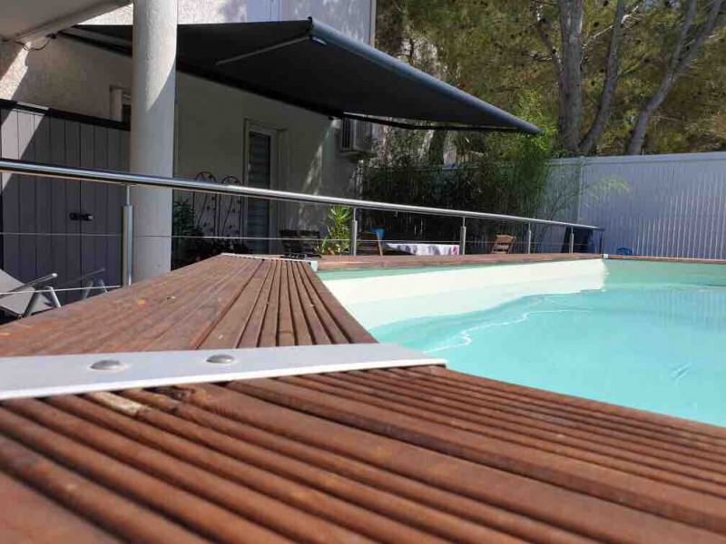 Pose d'un store  banne coffre ambre sur Martigues