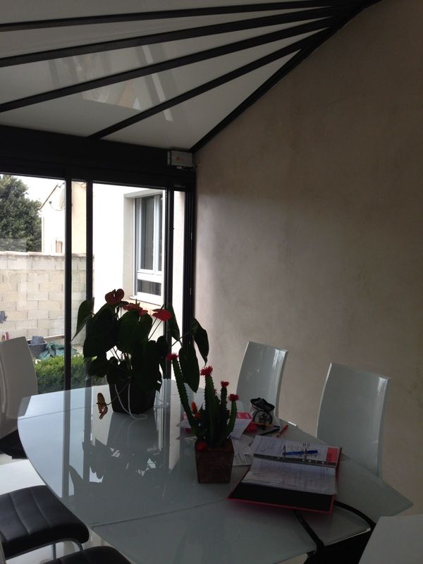 Véranda ou pièce à vivre avec toiture isolante